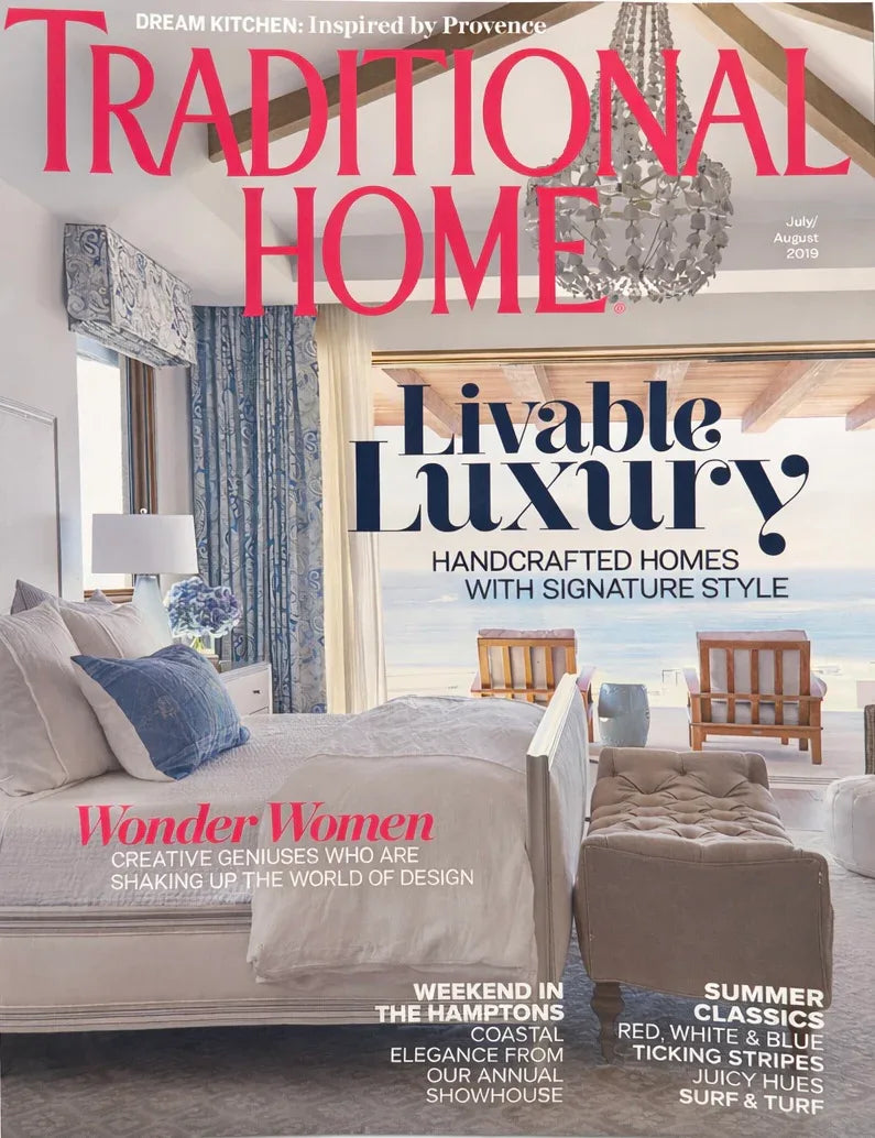 Cover of 'Traditional Home' magazine featuring a living room with furniture and decor.
